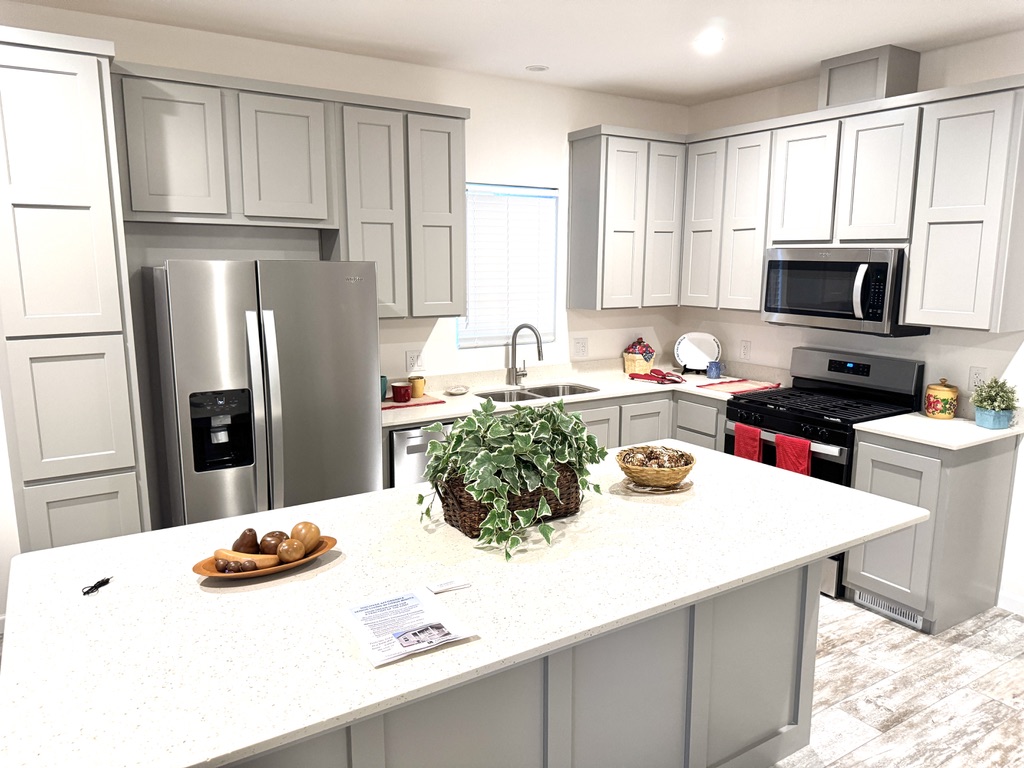 Kitchen and island in a BMH home example
